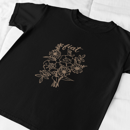 Black t-shirt with floral design and 'eat' text on a white background